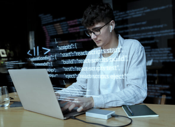 programming-background-with-person-working-with-codes-computer